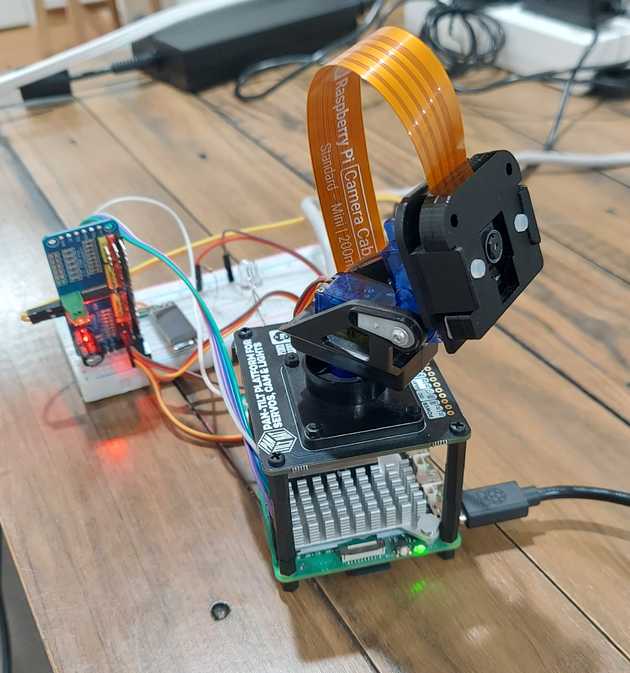 Pan-tilt servos on Raspberry Pi 5 with a camera attached